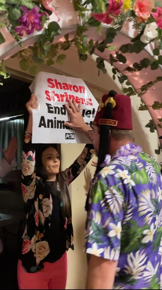 Protester at Sharon Shrine