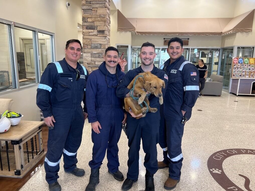 U.S. Coast Guard Heartland Team With Dog Rescued from Shipping Container