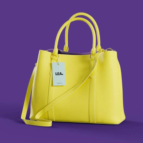 A yellow faux leather handbag with a LEA tag