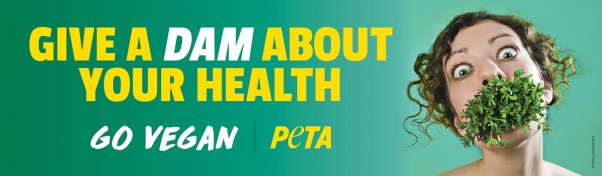 Billboard with text reading "Give a DAM about your health. Go Vegan" with a photo of a person whose moth is full of leafy greens