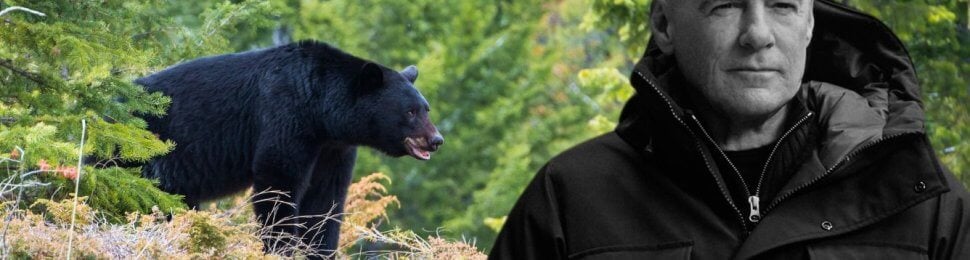 Bryan Adams and a Black Bear in rocky mountains