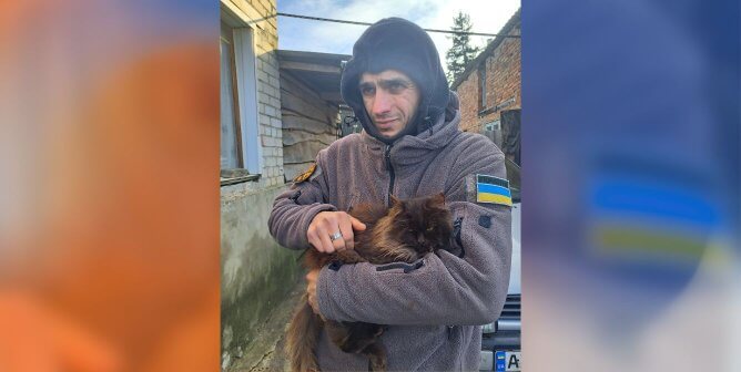 PETA-supported rescuer saving cat