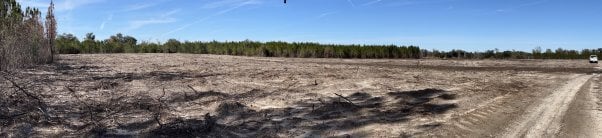 A panoramic shot of a bulldozed field