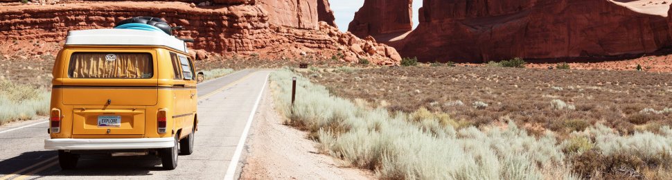 Yellow van going through the desert