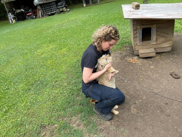 Nina greeting a fieldworker
