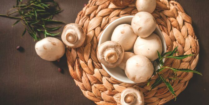 A bowl of white mushrooms