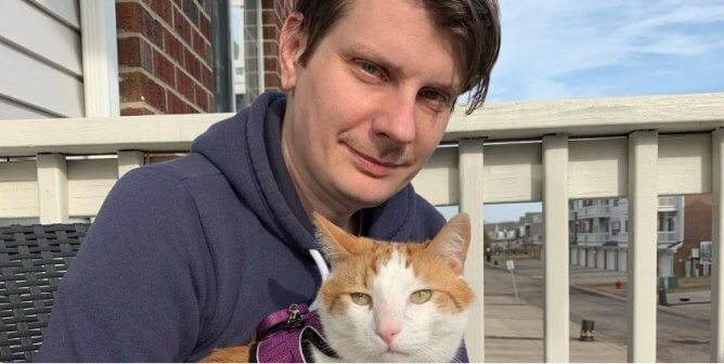Ken Montville with his cat