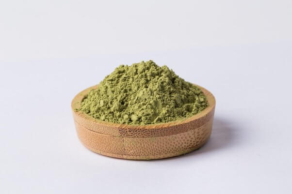 matcha powder in clay bowl