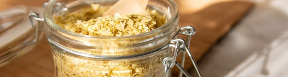 Nutritional yeast and wooden spoon