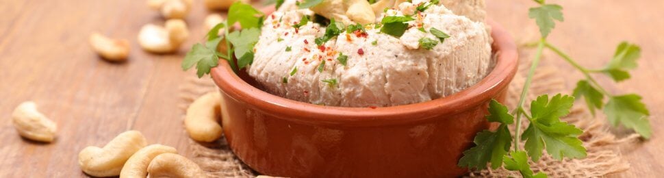 cashew cheese and loose cashews and herbs