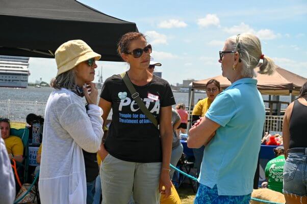 PETA staff conversing with Norfolk city council member
