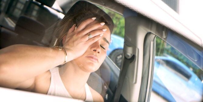 Clarissa in a hot car