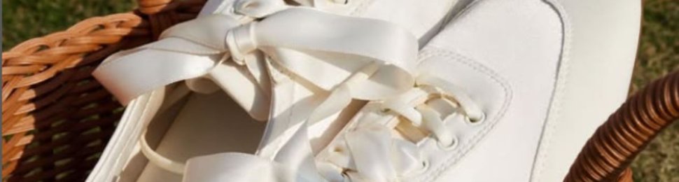 a pair of sneakerina shoes in a picnic basket