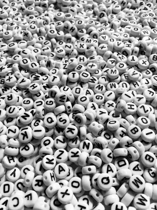 a pile of alphabet beads
