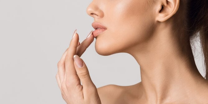 woman touching lips
