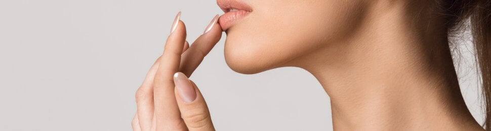 woman touching lips