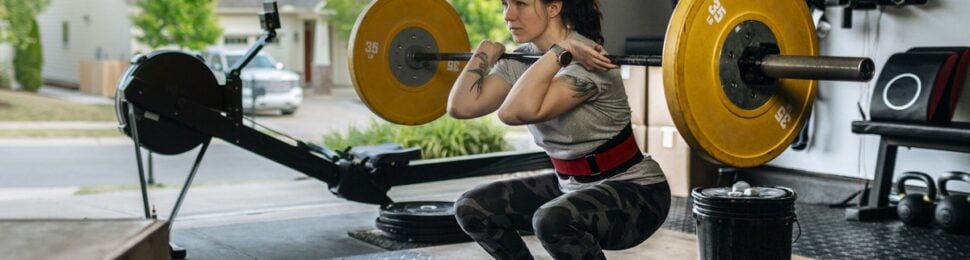 woman lifting heavy weights