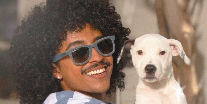 Perez and a small white dog