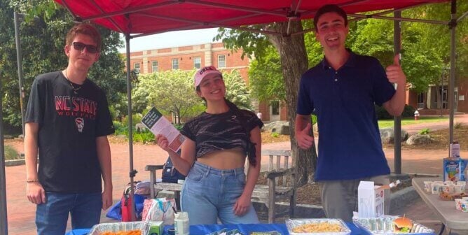 A group of people tabling at an event
