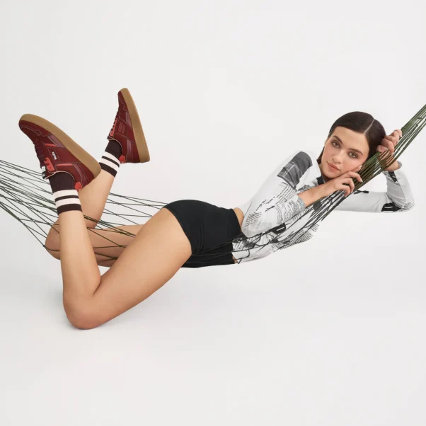 Woman in a hammock wearing MoEa's new vegan shoes.