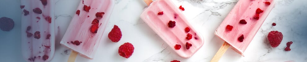 Pink raspberry popsicles