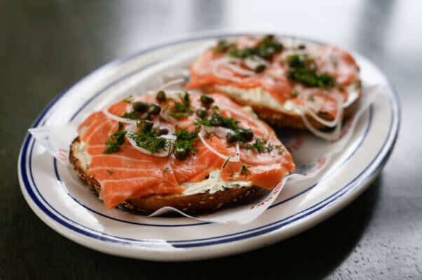 cultured salmon flesh on bagels