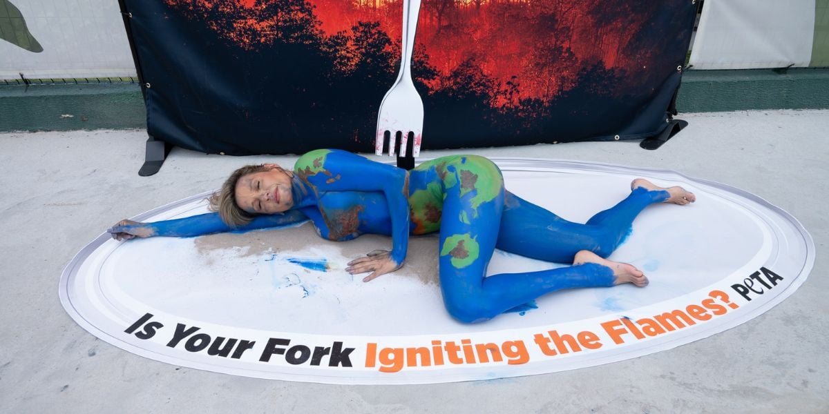 Woman painted as the Earth