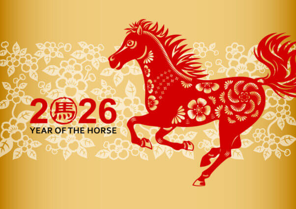Red colored paper cut horse on a floral background, the Chinese stamp means horse