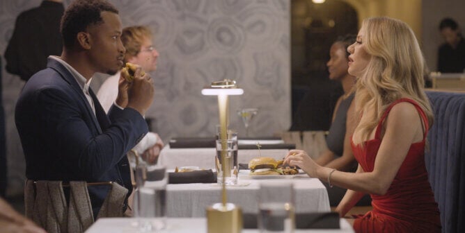 A man and a woman in a restaurant