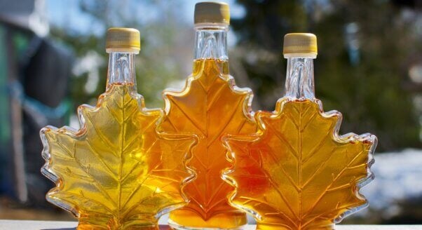 Three bottles of maple syrup