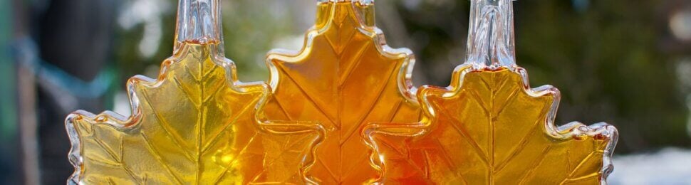 Three bottles of maple syrup