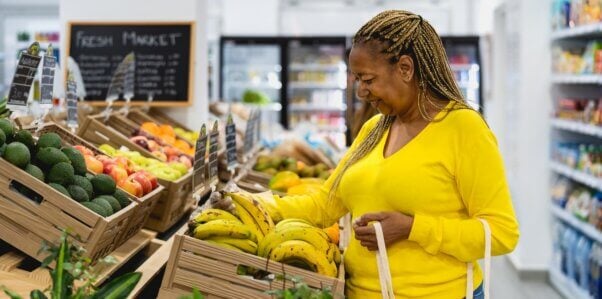 Woman shopping for fresh fruit