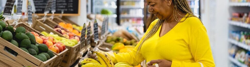 Woman shopping for fresh fruit
