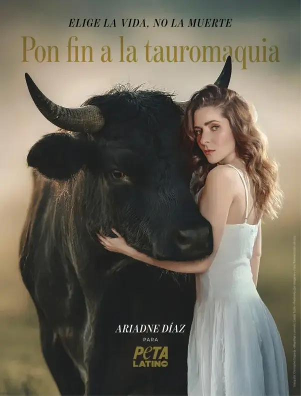 Ariadne Diaz holding a bull