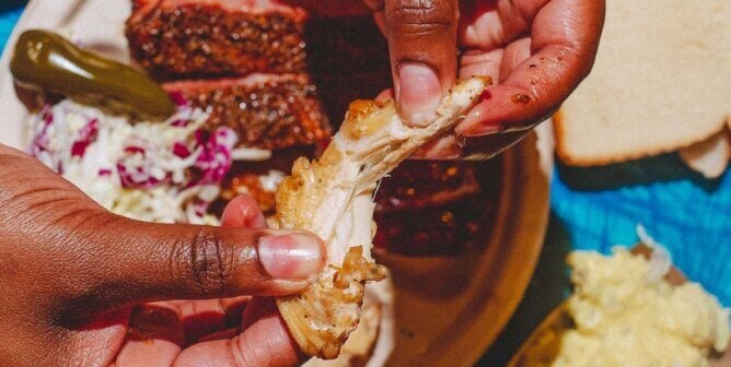Person ripping apart vegan chicken