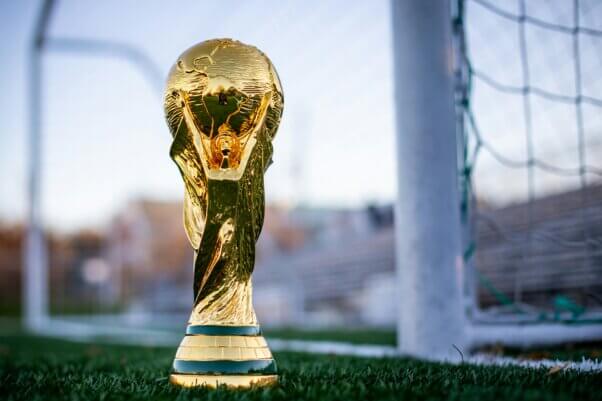 World Cup trophy on a soccer field