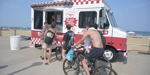 People lined up outside PETA's Free the Chicken truck