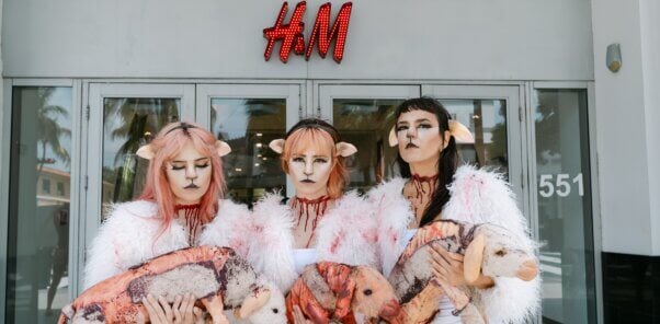 Demonstrators dressed as 'bloodied' sheep