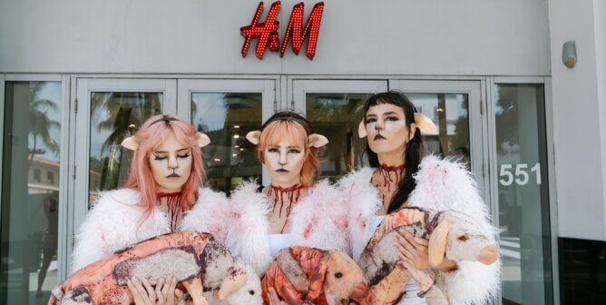 Demonstrators dressed as 'bloodied' sheep