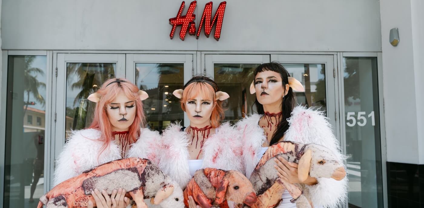 Demonstrators dressed as 'bloodied' sheep