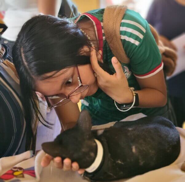 A guardian communes with her cat.