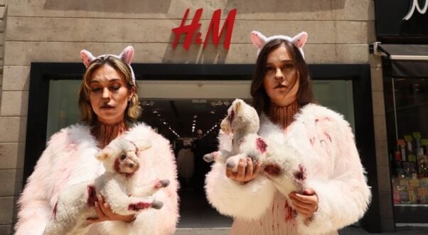 Close-up of PETA Latino activists protesting wool at an H&M store in Mexico City.