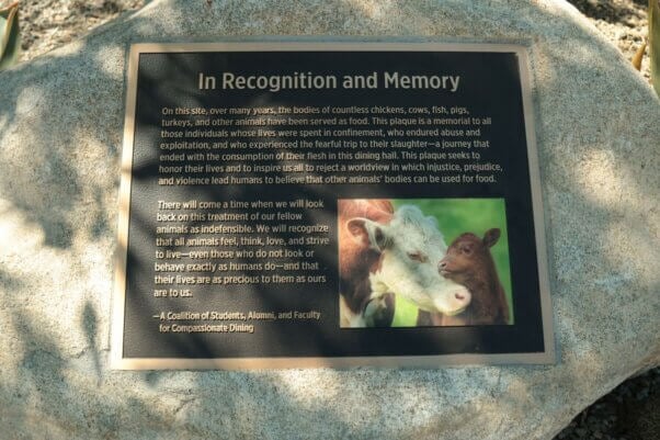 A close-up of Pitzer College's animal memorial plaque