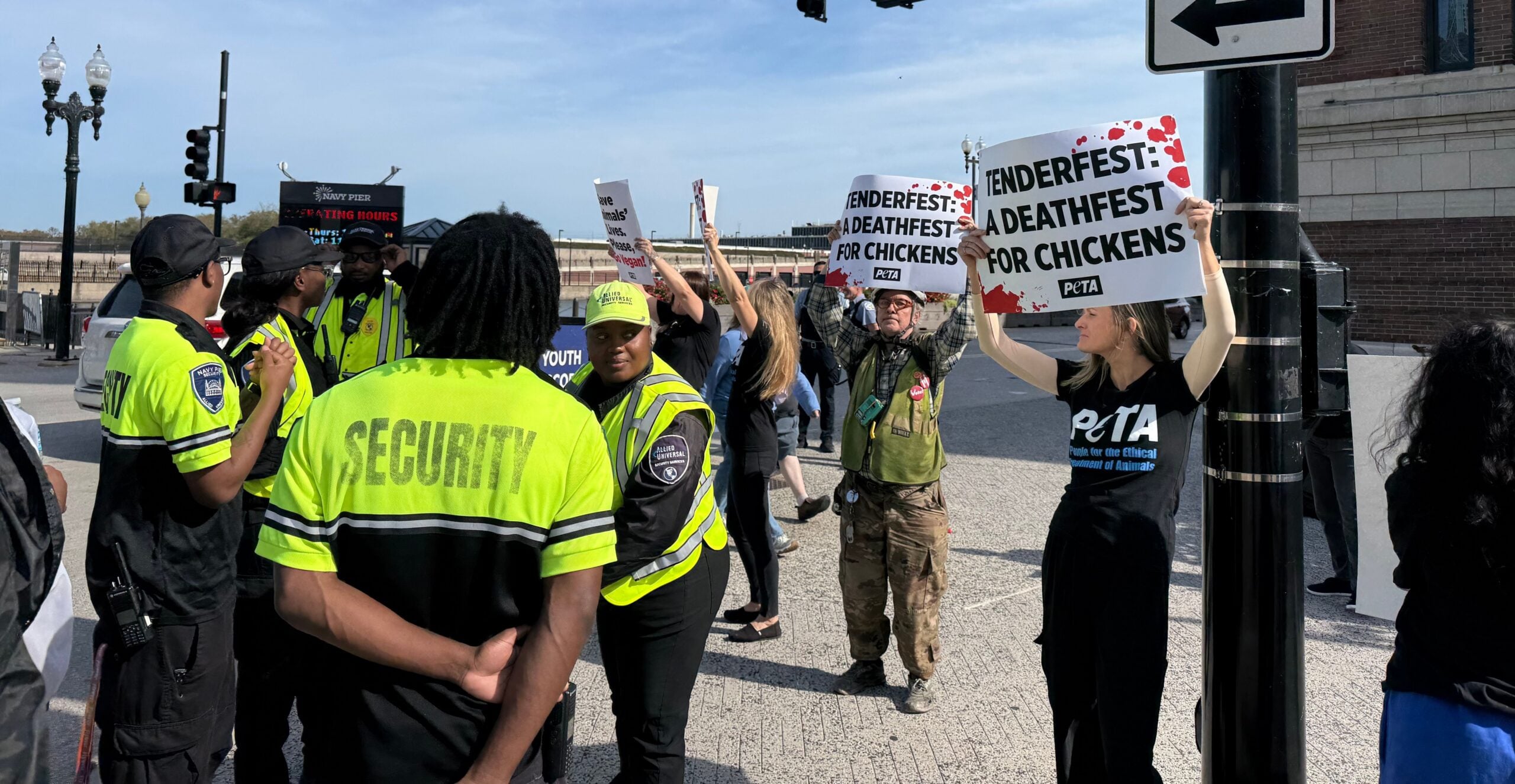 Security interacting with demonstrators